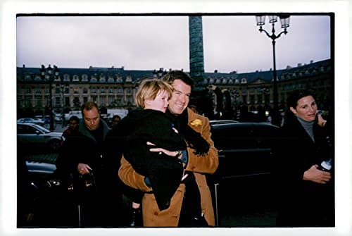 Vintage photo of Pierce Brosnan with the son of Dylan in Paris